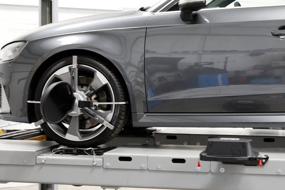 3D alignment wheel clamp fitted to an Audi