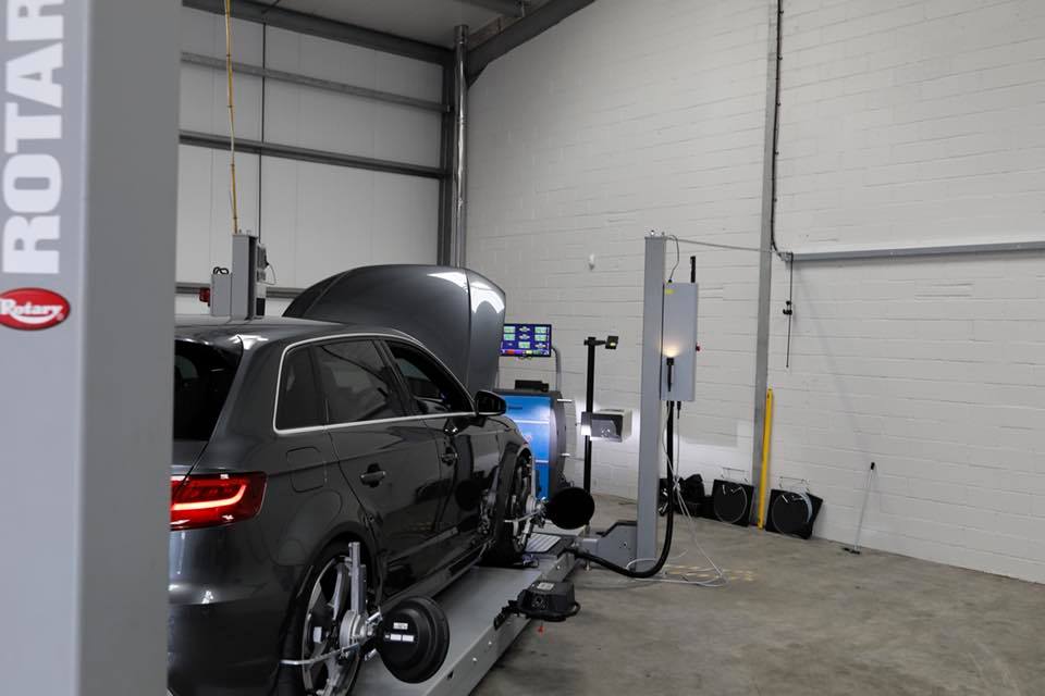 Audi on the Rotary lift with alignment equipment in the PLA workshop